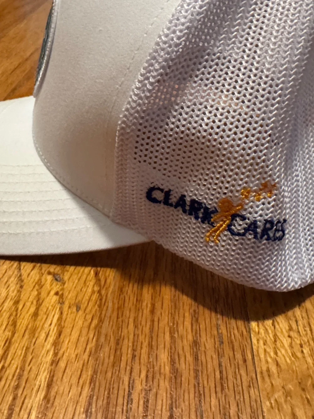 Travis Mathew Men’s white Patch Trucker Hat